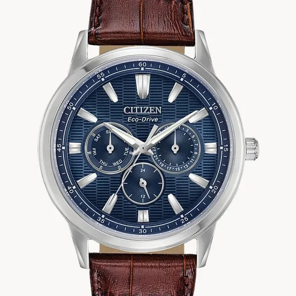 Citizen Eco-Drive — Red dial, steel case