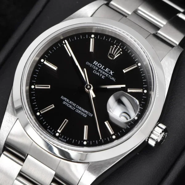 Rolex Oyster Perpetual — Black dial, steel case