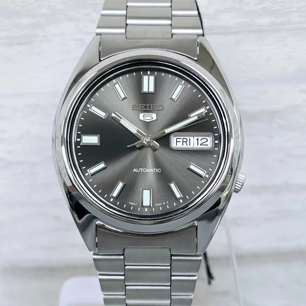 Seiko 5 — Black dial, steel case