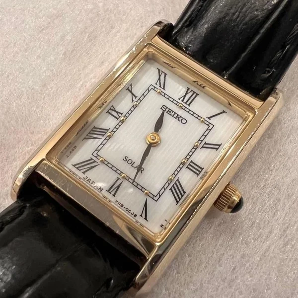 Seiko Solar — Red dial, steel case